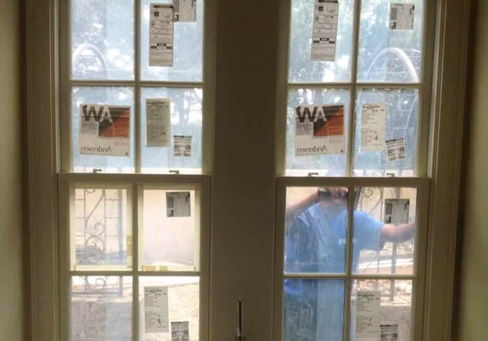 orange county window post construction cleaning glass wrap and stickers